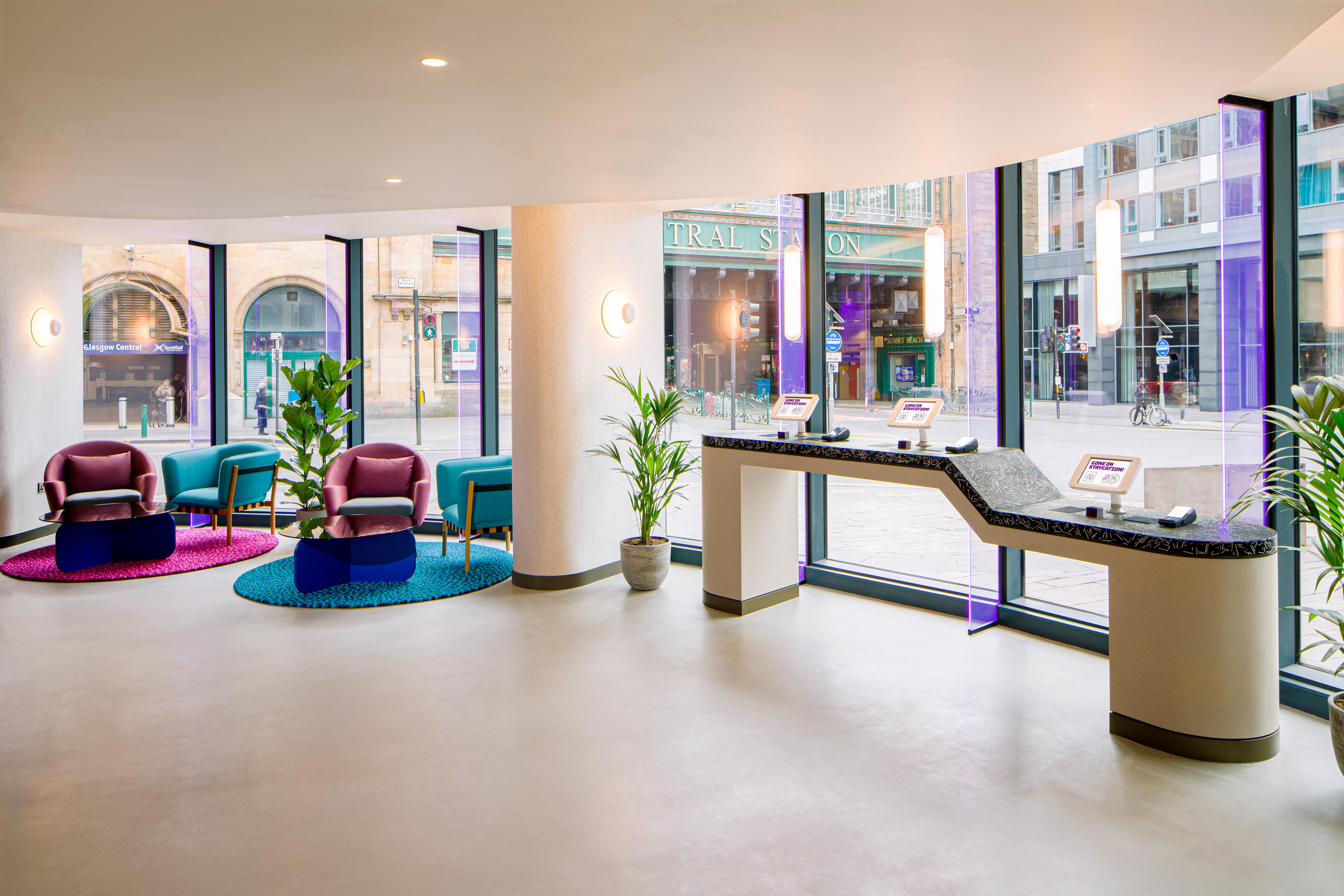 Yotel Glasgow Exterior photo Reception desk at Edinburgh Airport
